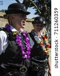 Small photo of London, UK. 27 August 2017. Female police officers getting into the carnival spirit. The Notting Hill Carnival parade get under way on Children's Day.