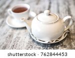 A White Porcelain Teapot And...
