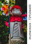 Small photo of Japanese Jizo Statue dedicated for the safety growth of children and as a memorial for still birth or miscarried children, Zojoji Temple, Tokyo Japan