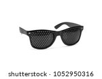 Small photo of Pin hole sunglasses. Anti Myopia Glasses for vision correction. Isolated on white background