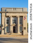 Small photo of Plano, Illinois - United States - September 18th, 2021: Old bank in downtown Plano on a beautiful sunny morning.