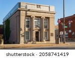 Small photo of Plano, Illinois - United States - September 18th, 2021: Old bank in downtown Plano on a beautiful sunny morning.