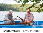 Two Seniors In The Boat Fishing ...