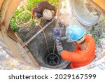 Small photo of Water Well Drilling, Dig a well for water, Inside The Well, Groundwater hole drilling machine, boreholes, Deep pit in the ground