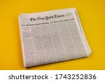Small photo of Cookstown, New Jersey 5-27-20 NJ / US. New York Times Newspaper with cover U.S DEATHS NEAR 100,000, AN INCALCULABLE LOSS on the yellow background.