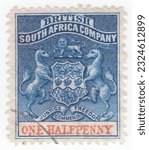 Small photo of RHODESIA - 1891: An ½ pence blue and vermilion postage stamp depicting Arms of the British South Africa Company. BSAC or BSACo was founded in 1889 with the support of the British Government