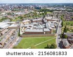Small photo of Aerial drone photo of the town of Armley in Leeds West Yorkshire in the UK, showing the famous HM Prison Leeds, or Armley Prison, showing the Jail walls from above on a sunny summers day.