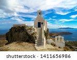 Small photo of Serifos, Cyclades islands, Greece, 10/01/2018: The church of Agios Constantinos in close up, the bay of Livadi and the island of Sifnos in background.