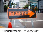 A Detour Sign Directs Traffic...