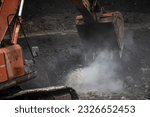 Small photo of backhoe, black soil, blue backhoe, bucket, closeup, coal, construct, construction equipment, dark soil, dig, dig up, digger, digging coal, digging hole, digging soil, dirt, dredger, earth, earth works