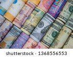 Closeup rolled of variety banknote around the world. Exchange rate and Forex investment concept.-Image.