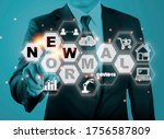 Businessman touching new normal wording with icon such as online shopping social distancing work from home and COVID19.The world is changing to balance it into new normal include business , economy , 