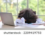 Small photo of Mid adult businesswoman lying face down on table in office after bad news business failure or get fired and feeling discouraged, distraught, distraught and hopeless in modern office.