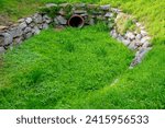 Small photo of drainpipe, water ditch, sewerage ditch.