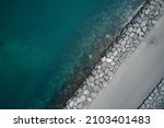 Small photo of Beautiful aerial view ocean and rock seawall
