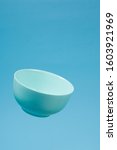 a blue ceramic mattle deep bowl ... | Shutterstock . vector #1603921969