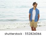 Laughing beach guy in shorts...