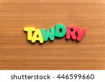 Small photo of tawdry colorful word on the wooden background
