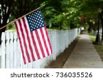 Small American Flag Hangs From...