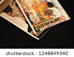 Small photo of Kiev, Ukraine - December 02, 2018: paper entry tickets at Leopold Museum at Museumsquartier (MQ), with images of paintings by Gustav Klimt and Egon Schiele, selective focus