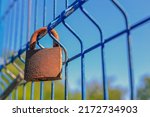 An Old Rusty Padlock Hanging On ...