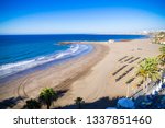 Spain Gran Canaria Sunny Beach on the Coast of San Agustin with azure Atlantic Ocean and Blue Sky