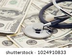 Heap Of Dollars With Stethoscope