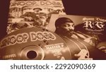 Small photo of Rome, Italy - May 07, 2019: Collection of covers and cd inserts of rapper Snoop Dogg. According to some rappers it is one of the best, thanks to the original lyrics and the great capacity of MC