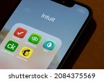 Small photo of Portland, OR, USA - Dec 1, 2021: Apps by Intuit are seen on an iPhone - TurboTax, Quickbooks, Mint, Credit Karma, and Mailchimp. Intuit Inc. is an American financial software company.