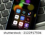 Small photo of Portland, OR, USA - Feb 3, 2022: Assorted website builders apps are seen on an iPhone - WordPress, GoDaddy, Universe, Wix, Weebly, Adobe Spark Page, Squarespace, Milkeshake, and Strikingly.