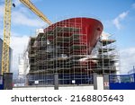 Small photo of Shipbuilding and crane during ferry construction surrounded by scaffold