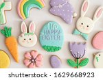 Happy Easter. Multicolored pastel easter cookies on a white background. Easter concept