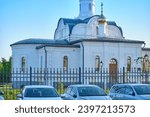 Small photo of Khabarovsk, Russia - Sep 27, 2021: Church of the Icon of the Mother of God Gracious Heaven opposite the international airport in the evening at sunset