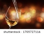 White Wine Being Poured In The...