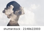 Small photo of Multiple exposure clouds Woman mental health and weather dependent concept.
