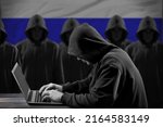 Small photo of Many russian hackers in troll farm. Cyber crime and security concept. Flag in background.