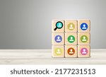 Small photo of Buyer persona and target customer concept. Personalized marketing. wood cubes with buyer persona icons.