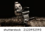 Small photo of Barbershop armchair, modern hairdresser and hair salon, barber shop for men. Stylish vintage barber chair. Professional hairstylist in barbershop interior. Copy space.