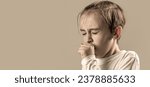 Small photo of Treatment of colds and flu. Boy coughing sick colds sneezing cough. Children coughs. Child is ill, he coughs.