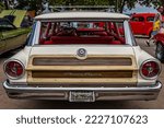 Small photo of Des Moines, IA - July 02, 2022: High perspective rear view of a 1963 Ford Country Squire Station Wagon at a local car show.
