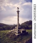 Small photo of Stone cross on the Camino de Santiago, Galicia, Spain. These symbols were built from the seventeenth century to sanctify the roads and pilgrims who walk to Santiago and other Catholic holy places.