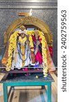 Small photo of "Thirumazhisai, Tamilnadu, India - Feb, 05, 2023 :Lord Perumal with Sridevi statue in temple, Hindu god in temple