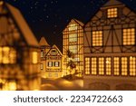 Merry Christmas and Happy New Year. Christmas village at winter night with stars