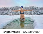Woman Stands In The Ice Hole ...