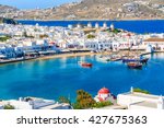 A View Of Mykonos Port With...