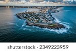 Small photo of aerial of Punta del Este city Uruguay Atlantic coastline with scenic skyscraper building and skyline drone golden hours