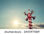 Horn speaker for public relations sign symbol, vintage color - sun with blue sky