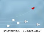 red paper plane changing... | Shutterstock .eps vector #1053056369