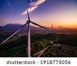 Wind Turbines Windmill Energy Farm at sunset in Italy, aerial view