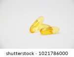 fish oil capsules on a white... | Shutterstock . vector #1021786000